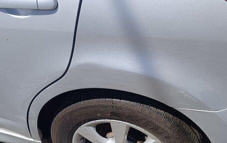 Nissan Tiida, 2010 год, 900 000 рублей, 12 фотография