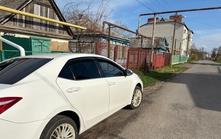 Toyota Corolla, 2013 год, 1 100 000 рублей, 6 фотография