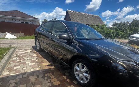 Renault Laguna III рестайлинг, 2008 год, 900 000 рублей, 13 фотография
