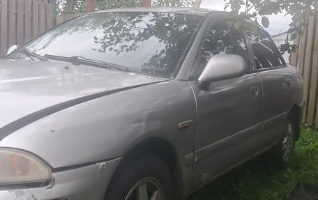 Mitsubishi Carisma I, 2000 год, 100 000 рублей, 4 фотография
