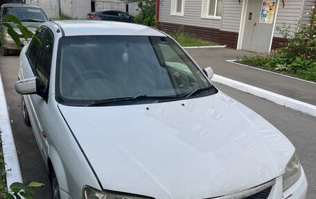 Mazda Familia, 2001 год, 250 000 рублей, 12 фотография