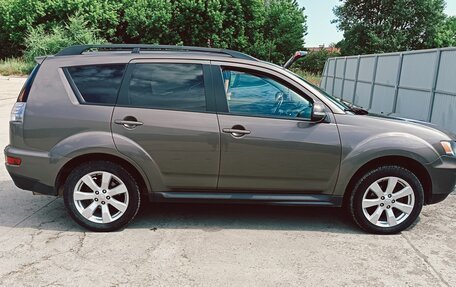 Mitsubishi Outlander III рестайлинг 3, 2012 год, 1 200 000 рублей, 19 фотография