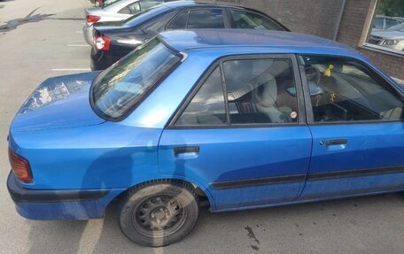 Mazda 323, 1992 год, 100 000 рублей, 3 фотография