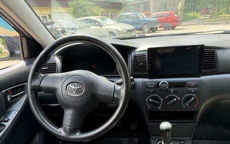 Toyota Corolla, 2004 год, 590 000 рублей, 5 фотография