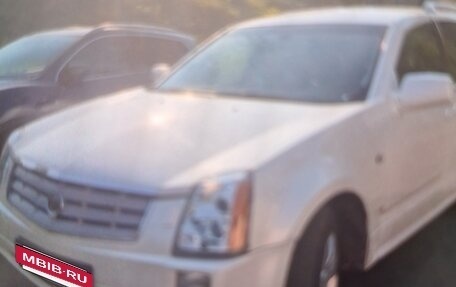 Cadillac SRX II рестайлинг, 2009 год, 550 000 рублей, 3 фотография