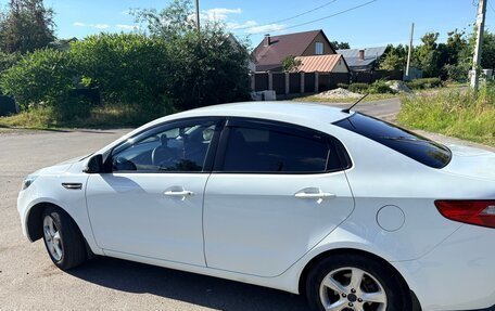 KIA Rio III рестайлинг, 2013 год, 830 000 рублей, 4 фотография