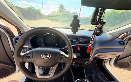 KIA Rio III рестайлинг, 2013 год, 830 000 рублей, 21 фотография