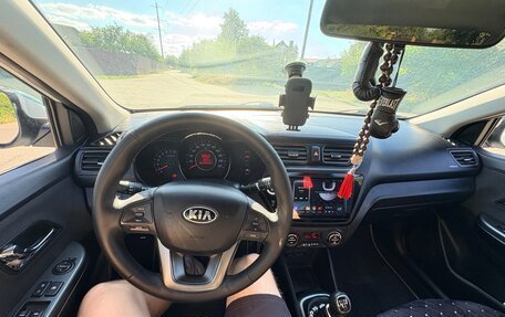 KIA Rio III рестайлинг, 2013 год, 830 000 рублей, 33 фотография