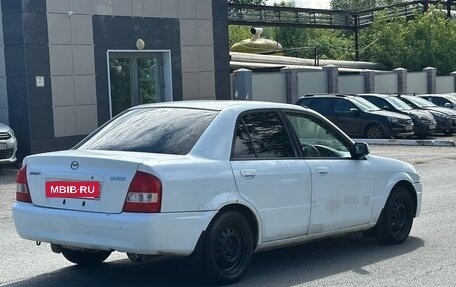 Mazda Familia, 1999 год, 129 000 рублей, 4 фотография
