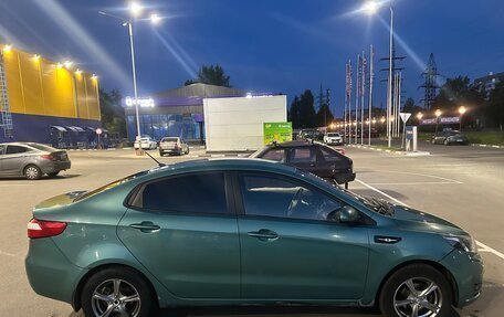 KIA Rio III рестайлинг, 2011 год, 690 000 рублей, 3 фотография