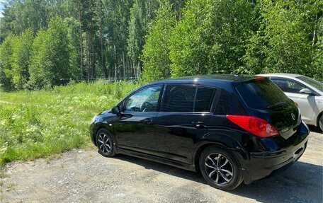 Nissan Tiida, 2010 год, 670 000 рублей, 4 фотография