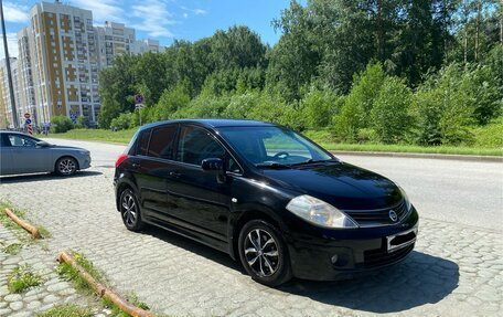 Nissan Tiida, 2010 год, 670 000 рублей, 9 фотография