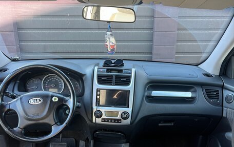 KIA Sportage II, 2009 год, 900 000 рублей, 13 фотография
