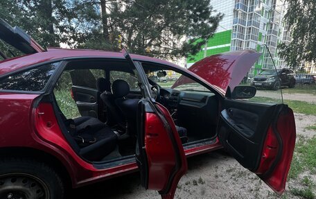 Mazda 323, 1998 год, 150 000 рублей, 11 фотография