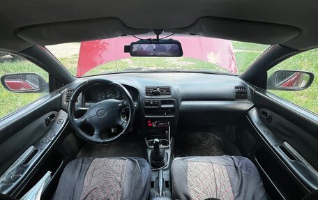 Mazda 323, 1998 год, 150 000 рублей, 17 фотография
