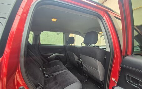 Mitsubishi Outlander III рестайлинг 3, 2011 год, 1 350 000 рублей, 13 фотография