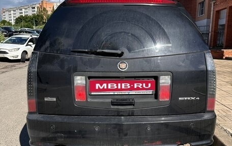Cadillac SRX II рестайлинг, 2009 год, 800 000 рублей, 3 фотография