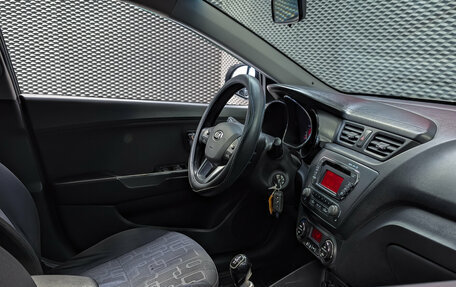 KIA Rio III рестайлинг, 2013 год, 750 000 рублей, 24 фотография