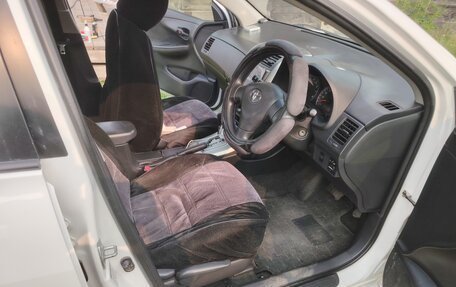 Toyota Corolla, 2011 год, 900 000 рублей, 10 фотография