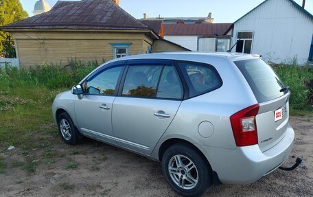 KIA Carens III (RP), 2010 год, 700 000 рублей, 3 фотография