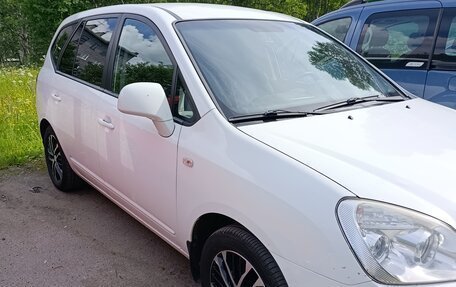 KIA Carens III (RP), 2011 год, 595 000 рублей, 3 фотография