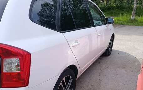 KIA Carens III (RP), 2011 год, 595 000 рублей, 10 фотография