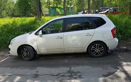 KIA Carens III (RP), 2011 год, 595 000 рублей, 17 фотография