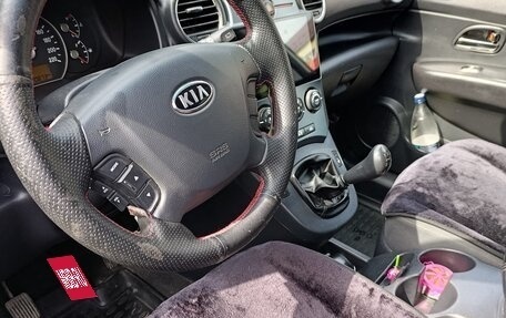 KIA Carens III (RP), 2011 год, 595 000 рублей, 9 фотография
