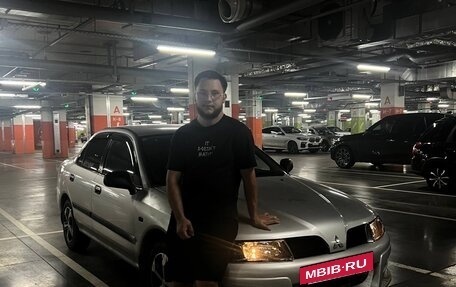 Mitsubishi Carisma I, 2002 год, 200 000 рублей, 10 фотография