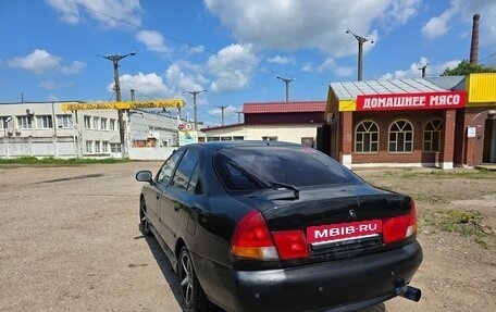 Mitsubishi Carisma I, 1997 год, 150 000 рублей, 3 фотография