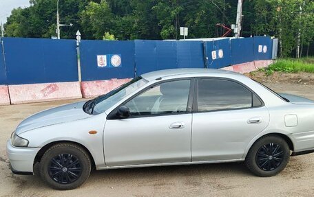 Mazda 323, 1996 год, 120 000 рублей, 4 фотография