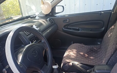 Mazda 323, 1996 год, 330 000 рублей, 3 фотография