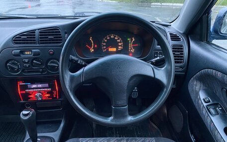 Mitsubishi Mirage VI рестайлинг, 1999 год, 220 000 рублей, 22 фотография