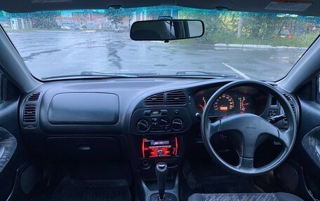 Mitsubishi Mirage VI рестайлинг, 1999 год, 220 000 рублей, 23 фотография