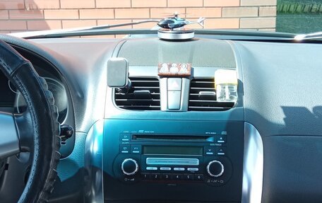 Suzuki SX4 II рестайлинг, 2010 год, 880 000 рублей, 14 фотография