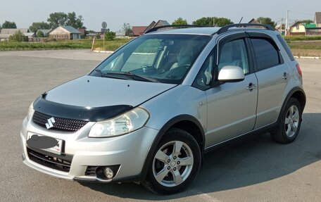 Suzuki SX4 II рестайлинг, 2010 год, 880 000 рублей, 24 фотография
