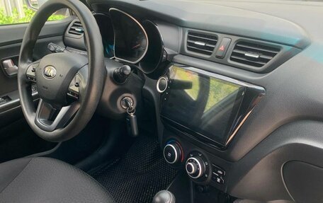 KIA Rio III рестайлинг, 2013 год, 769 000 рублей, 24 фотография