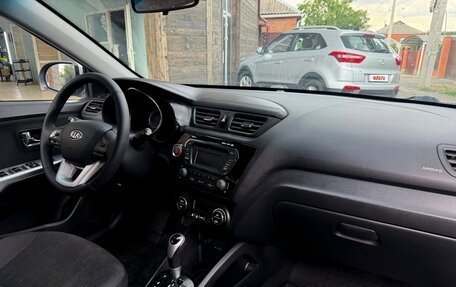KIA Rio III рестайлинг, 2013 год, 940 000 рублей, 2 фотография
