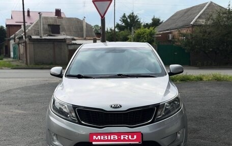 KIA Rio III рестайлинг, 2013 год, 940 000 рублей, 9 фотография