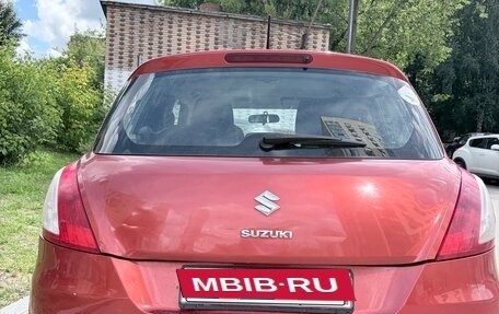 Suzuki Swift IV, 2011 год, 590 000 рублей, 2 фотография