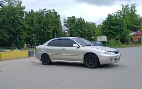 Mitsubishi Carisma I, 1998 год, 140 000 рублей, 2 фотография