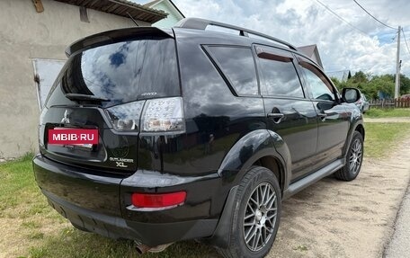 Mitsubishi Outlander III рестайлинг 3, 2011 год, 1 050 000 рублей, 6 фотография