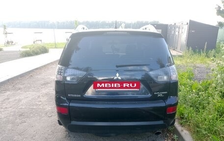 Mitsubishi Outlander III рестайлинг 3, 2007 год, 900 000 рублей, 4 фотография