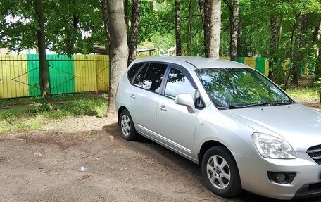 KIA Carens III (RP), 2011 год, 945 000 рублей, 3 фотография
