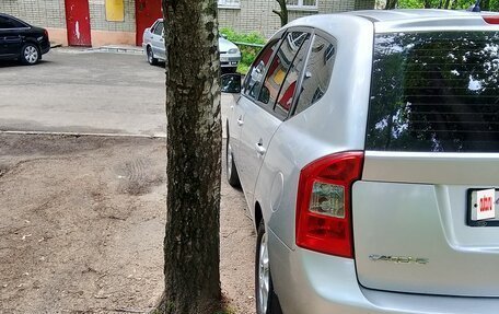 KIA Carens III (RP), 2011 год, 945 000 рублей, 4 фотография