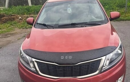 KIA Rio III рестайлинг, 2012 год, 680 000 рублей, 13 фотография
