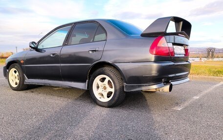 Mitsubishi Lancer VII, 1995 год, 600 000 рублей, 3 фотография