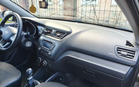 KIA Rio III рестайлинг, 2011 год, 875 000 рублей, 18 фотография