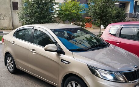 KIA Rio III рестайлинг, 2013 год, 750 000 рублей, 2 фотография