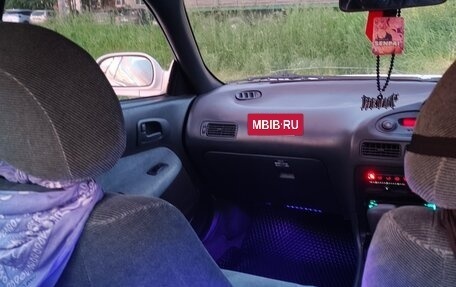 Toyota Sprinter Marino, 1993 год, 450 000 рублей, 12 фотография
